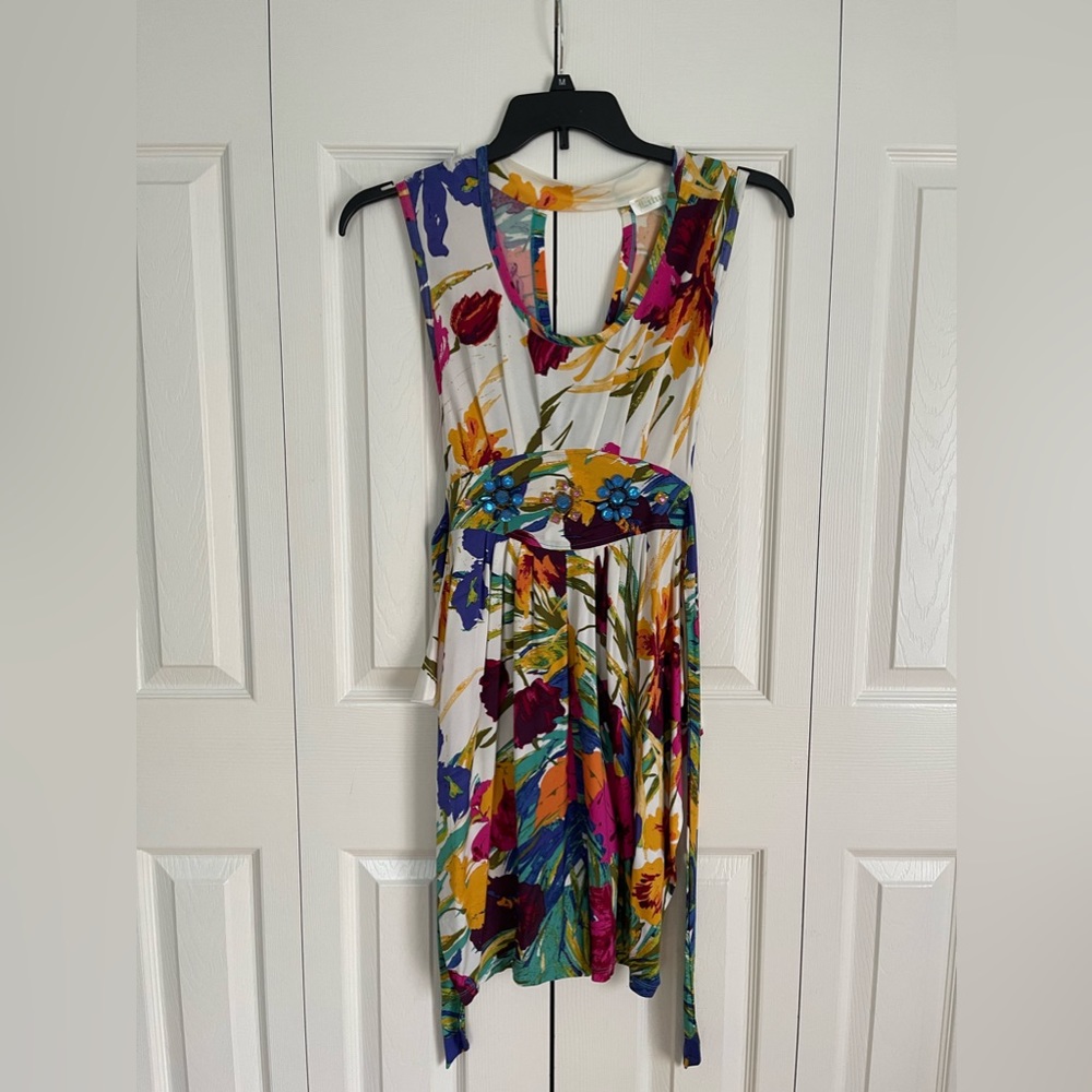 Beautiful colors very  nice dress🩷💜💙💛🤍